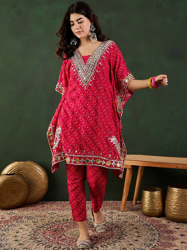 Close-up of mirror work detailing on bandhani kaftan kurta