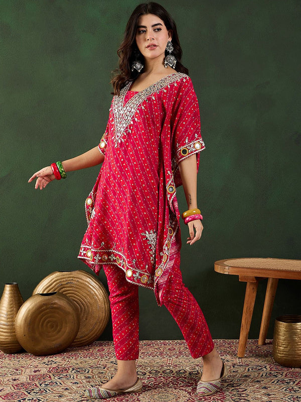 Kaftan style kurta paired with straight-fit trousers